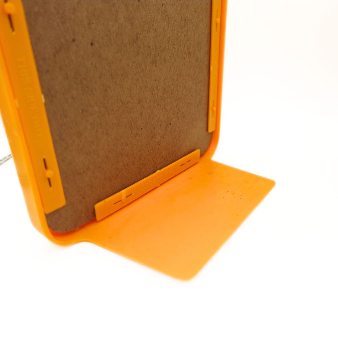 Photo of the back of a yellow 1980 Sesame Street Bookend