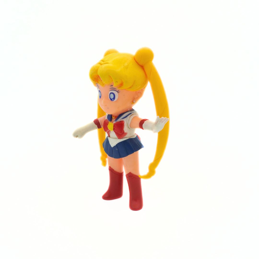 Angled photo of a vintage 1994 Bandai Sailor Moon figure with her arm outstretched