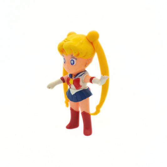 Angled photo of a vintage 1994 Bandai Sailor Moon figure with her arm outstretched