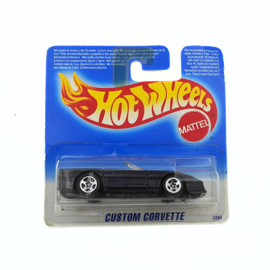 Hot Wheels Custom Corvette toy car in packaging on a white background