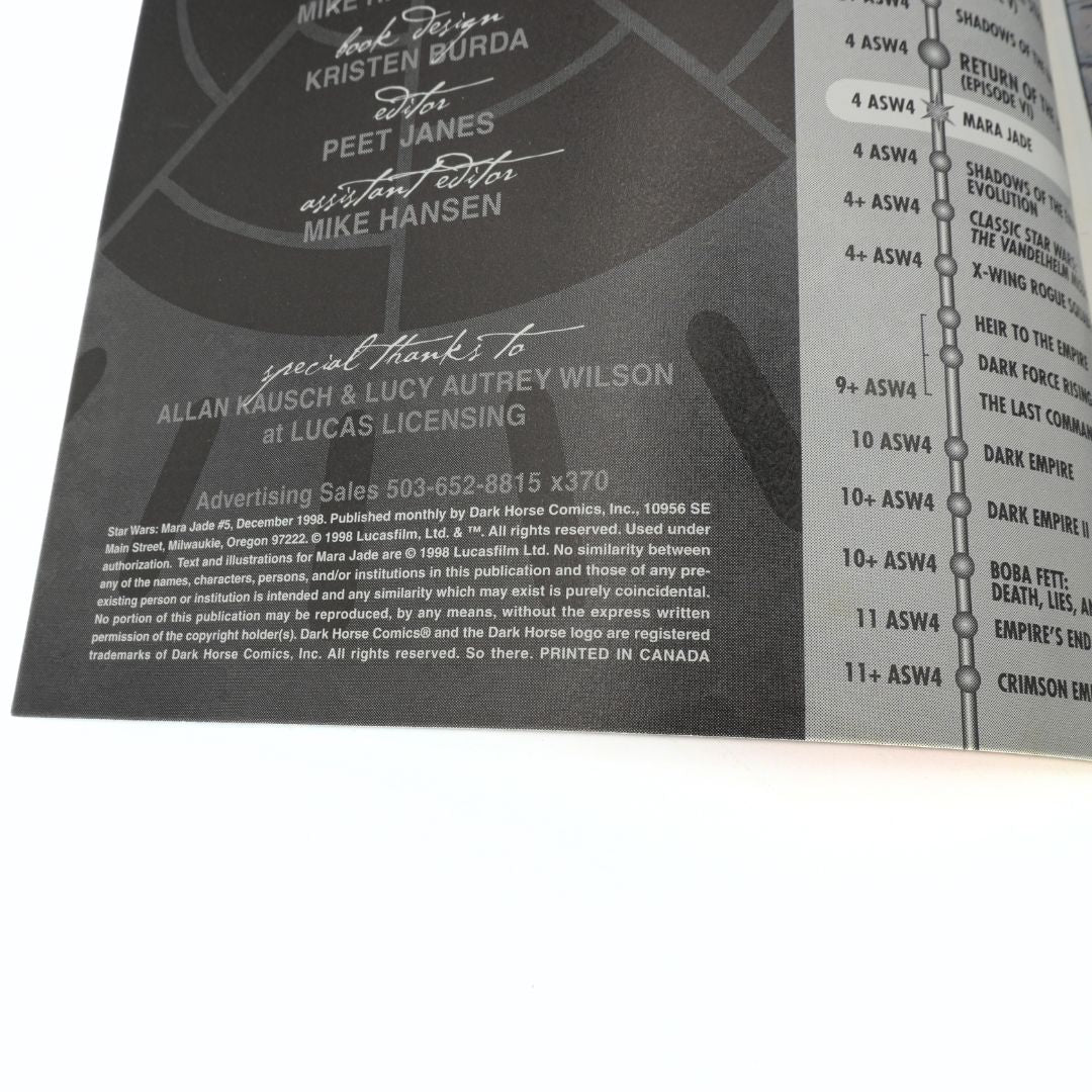 Publishing page of a comic book with text and branding details.
