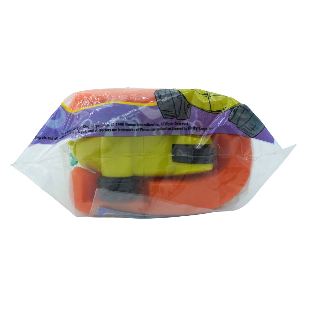 Colorful toy in packaging on a white background