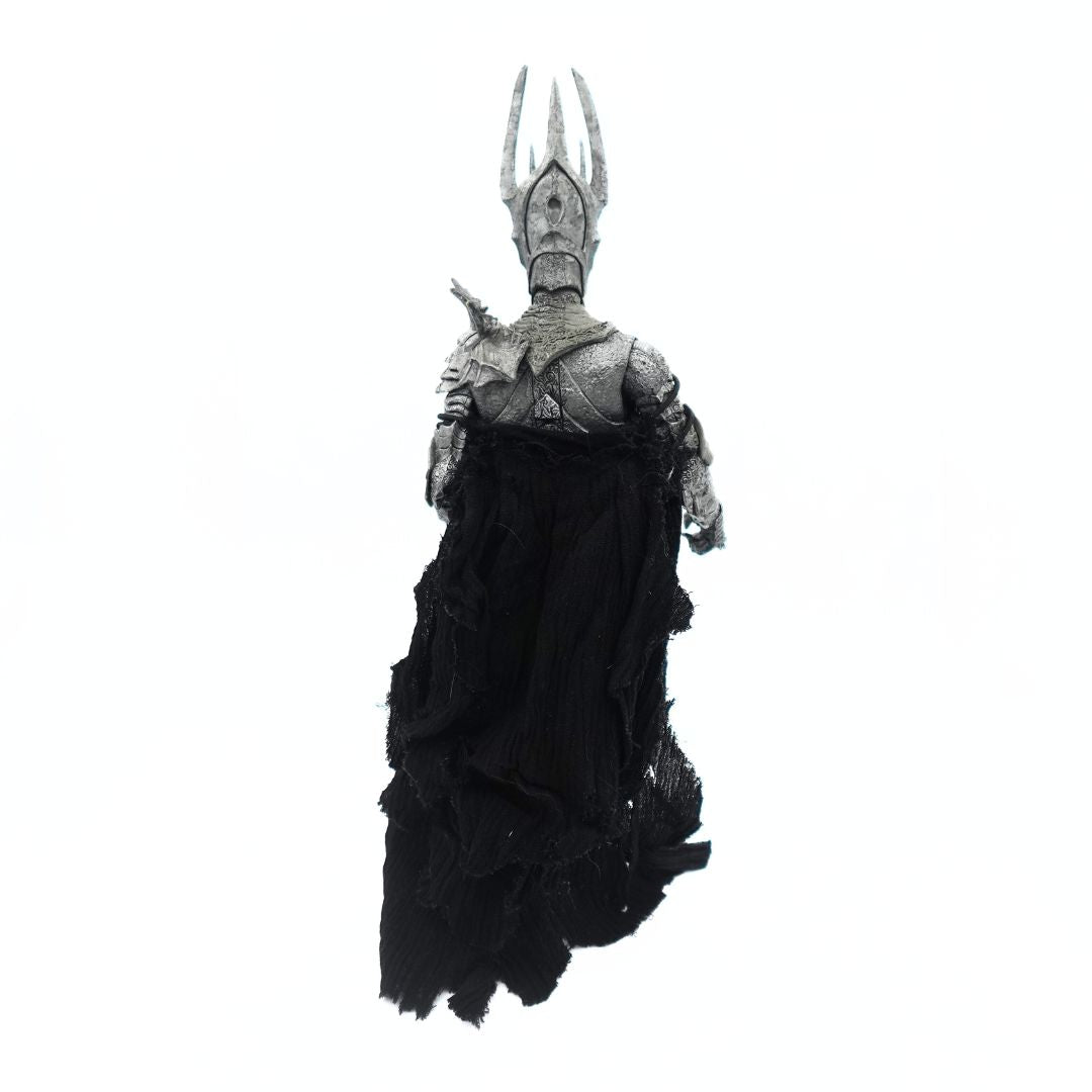 Photo of the back of a 2002 Sauron figurine released in line with the Lord of the Rings film series
