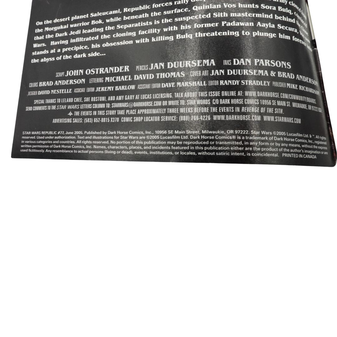 Back cover of a book with text and author names on a white background