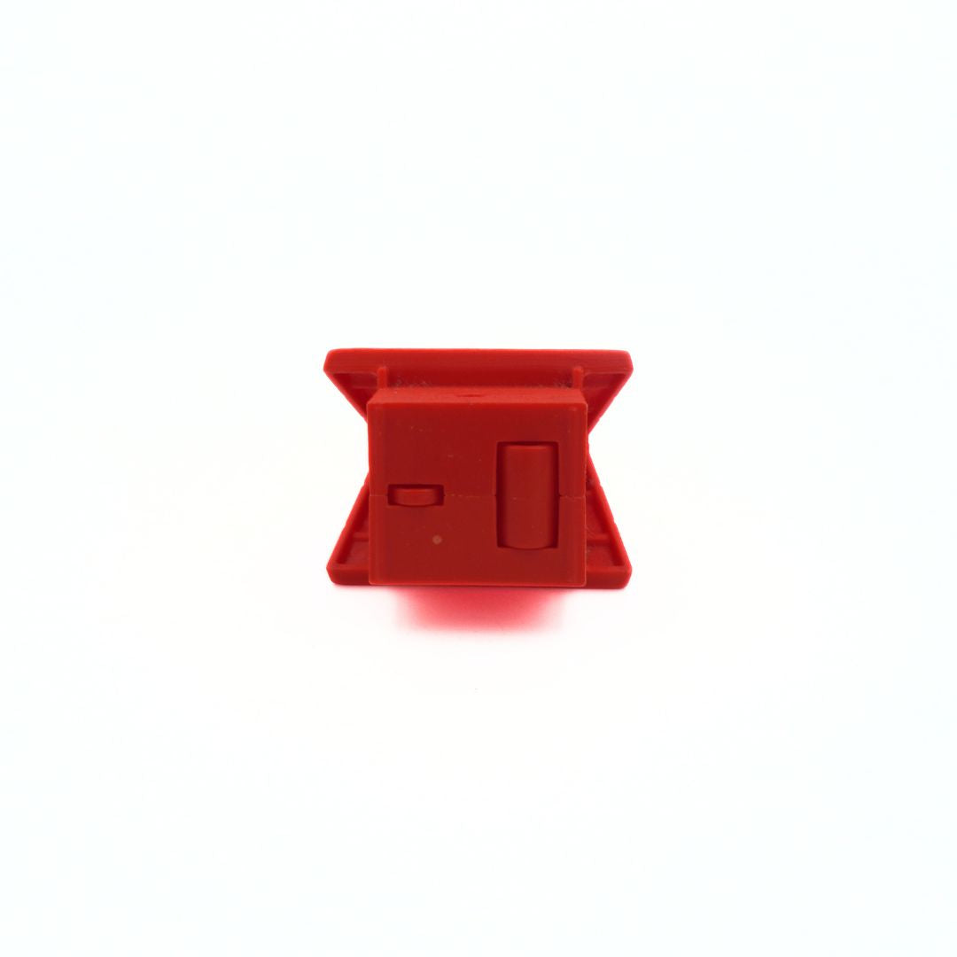 Underside of a red McDonalds Snoopy toy
