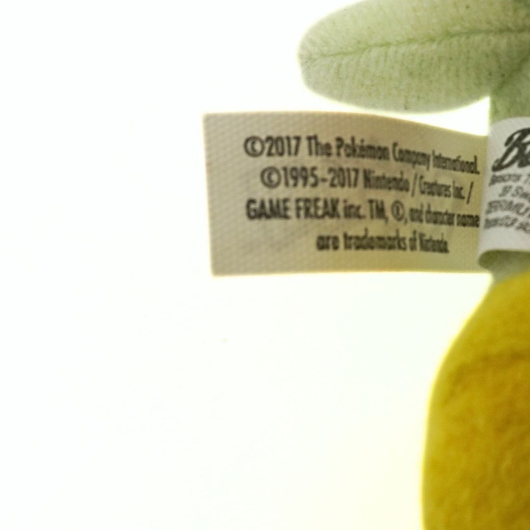 Close-up of a plush toy with a label showing copyright information.