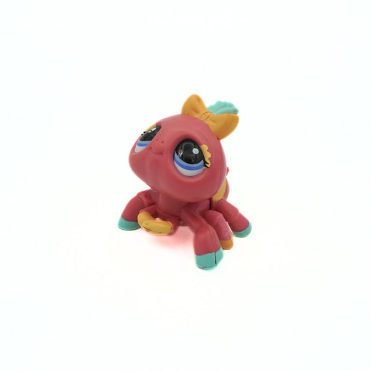 Pink Spider released by Littlest Pet Shop with a yellow bow