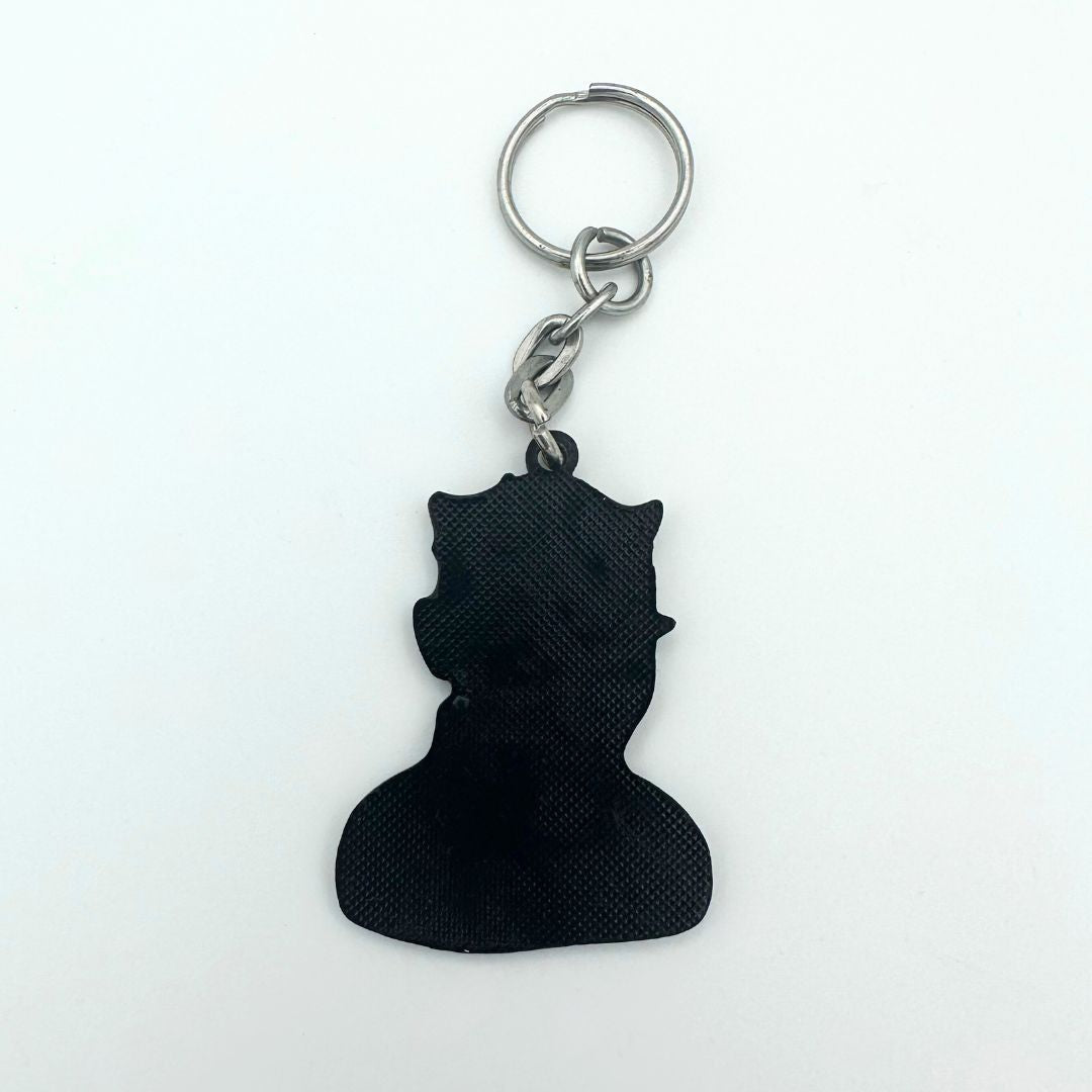 Rear side of a vintage Darth Maul keychain