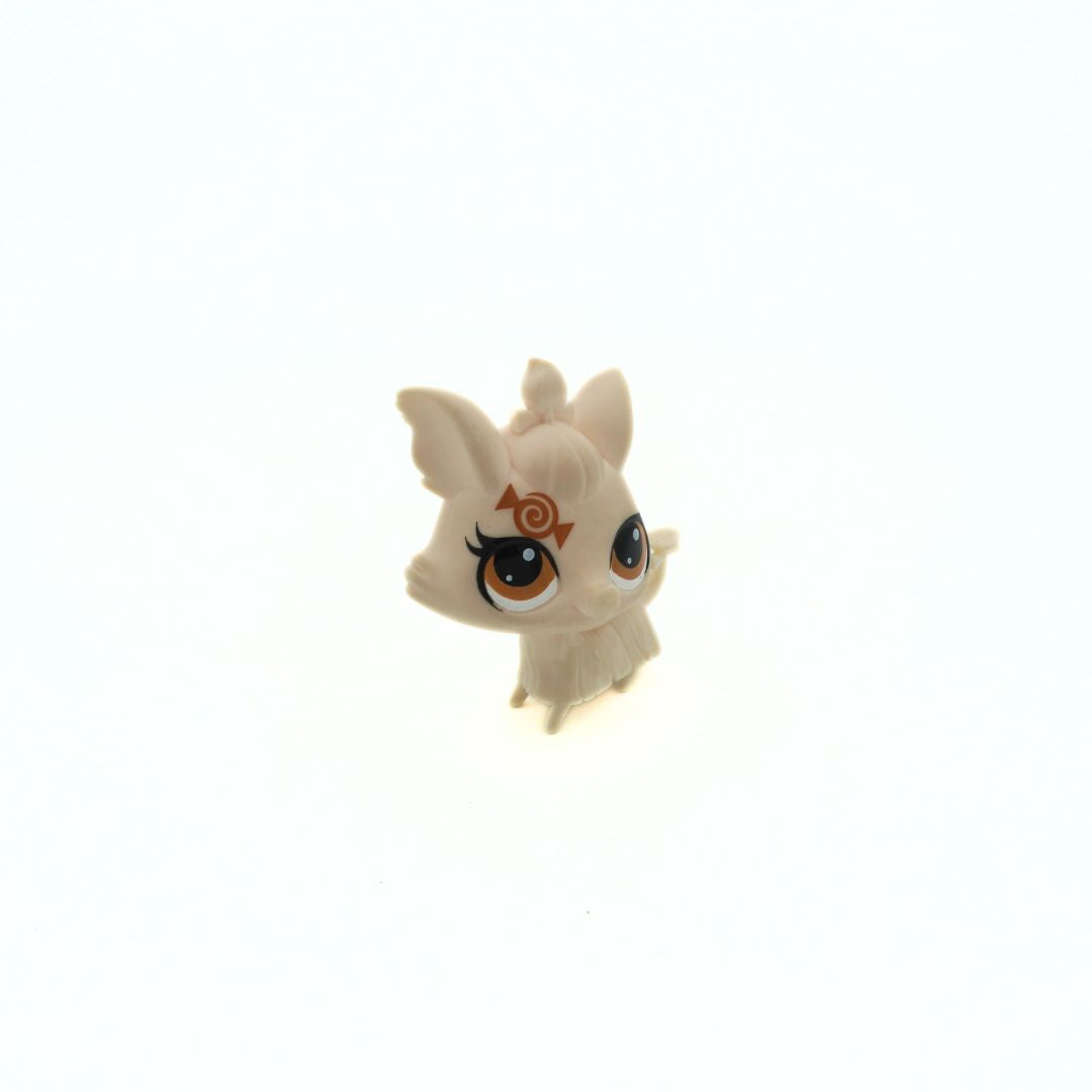 Mini Yorkshire Terrier figurine with brown eyes and candy detailing