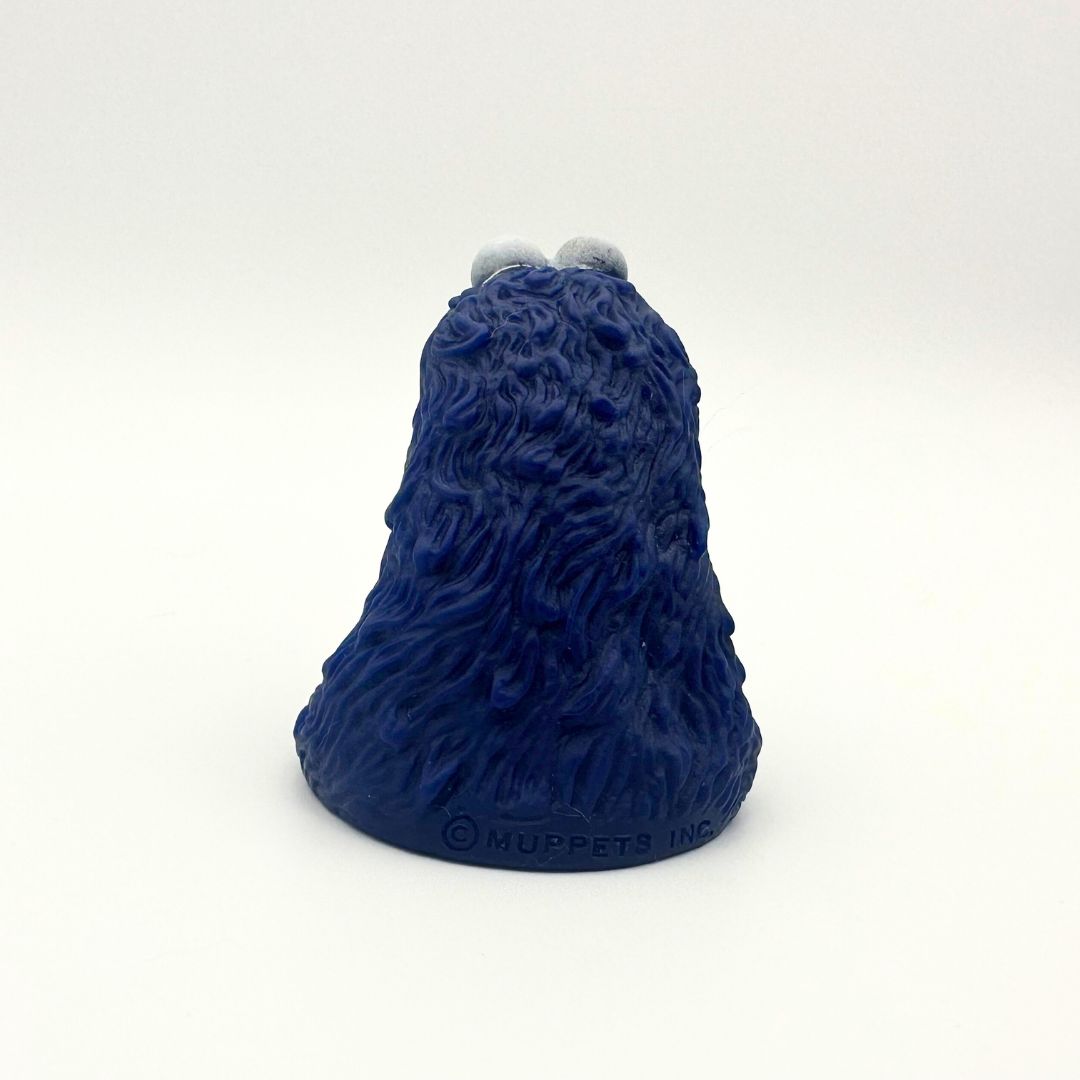 The back of a 1970's Cookie Monster finger puppet