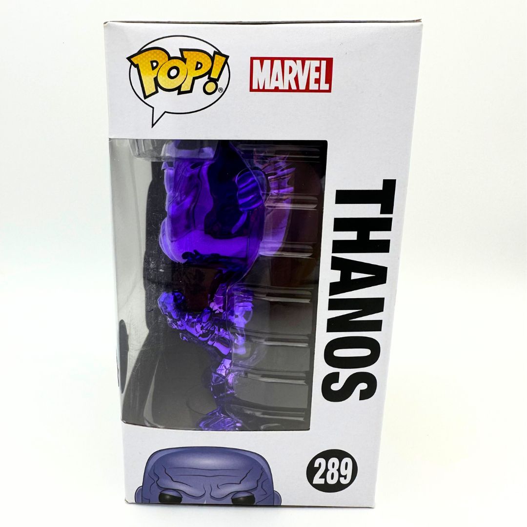 A side on photo of the Thanos 289 Funko Pop in its box, with the figure visible through the plastic