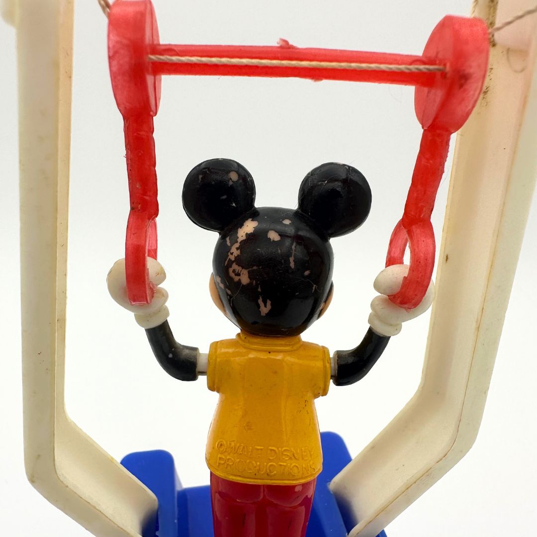 Close up of a vintage Walt Disney Mickey Mouse push puppet