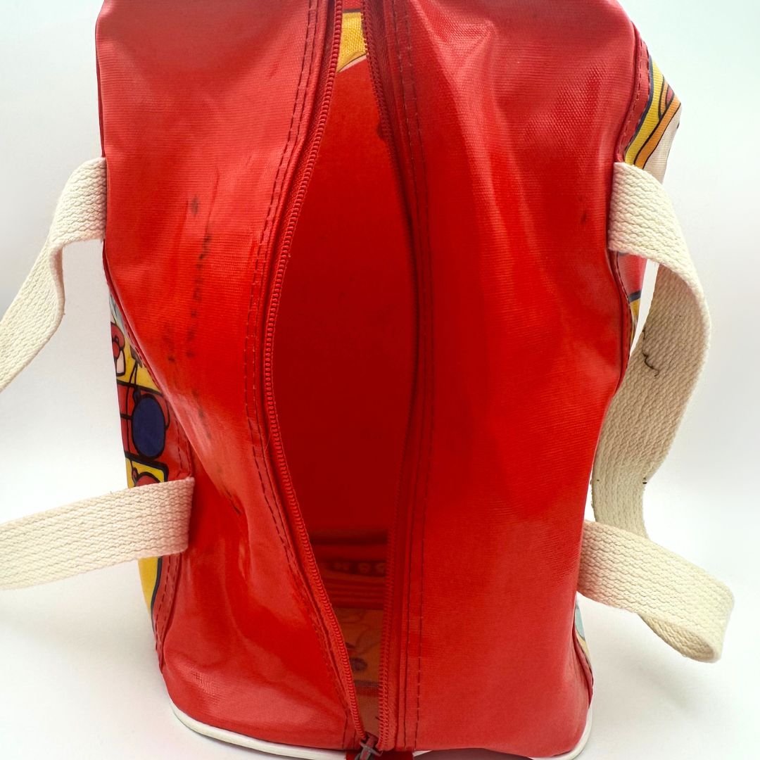 Interior of a red vintage Sanrio Hello Kitty bag
