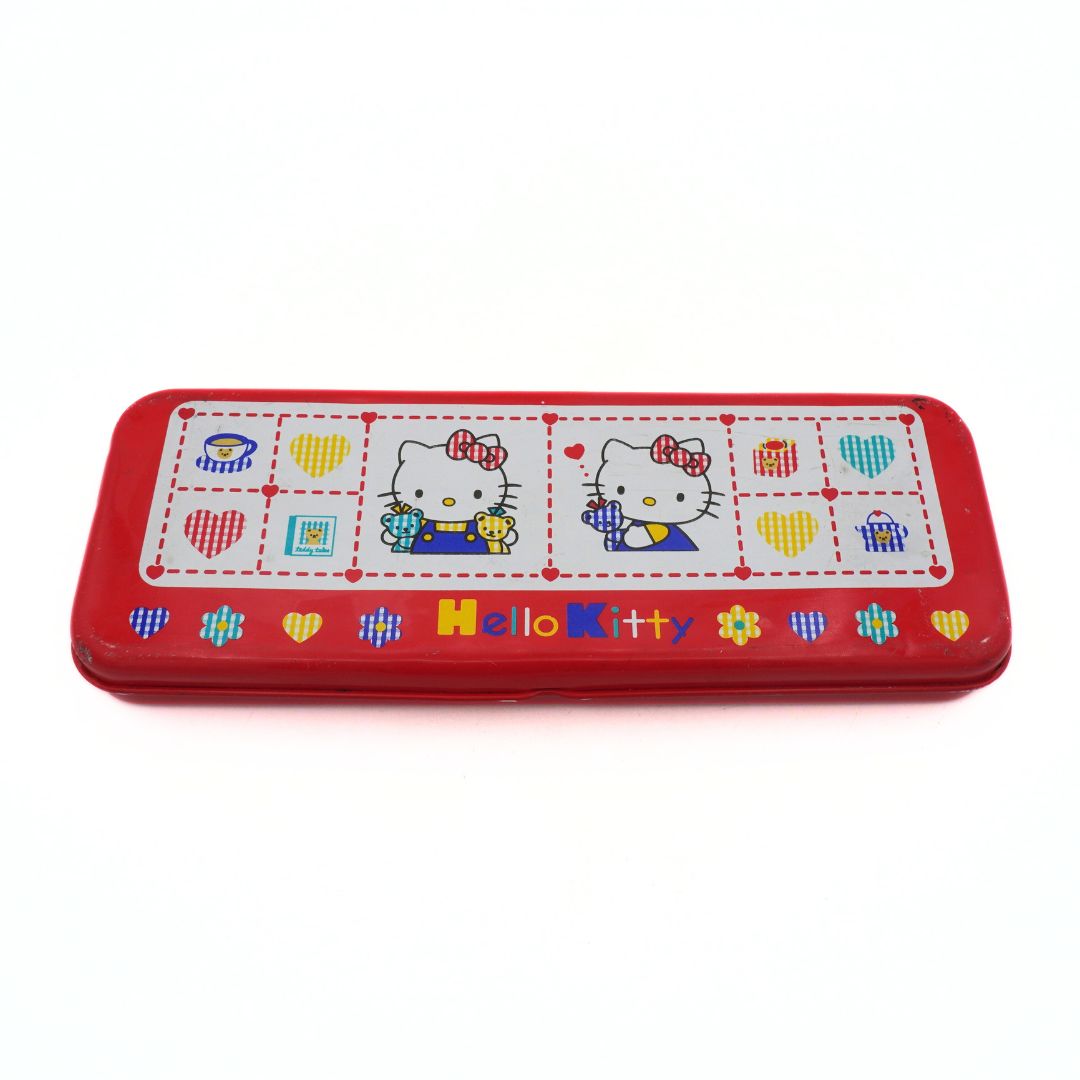 Red pencil case with Hello Kitty design on a white background