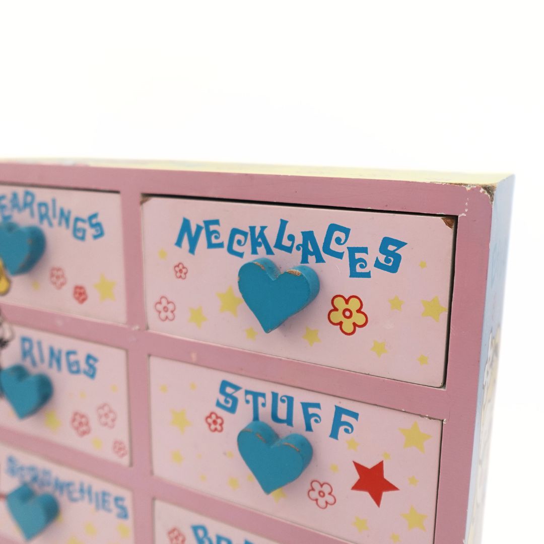 Close up of a Y2K jewellery box showing minor damage