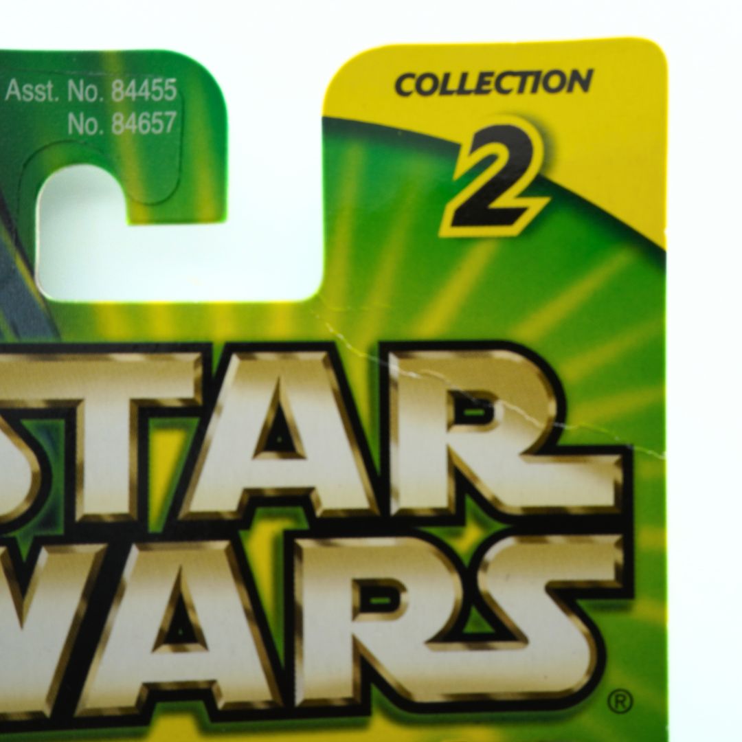 A 2001 Star Wars Collection 2 cardback showing creasing to the packaging