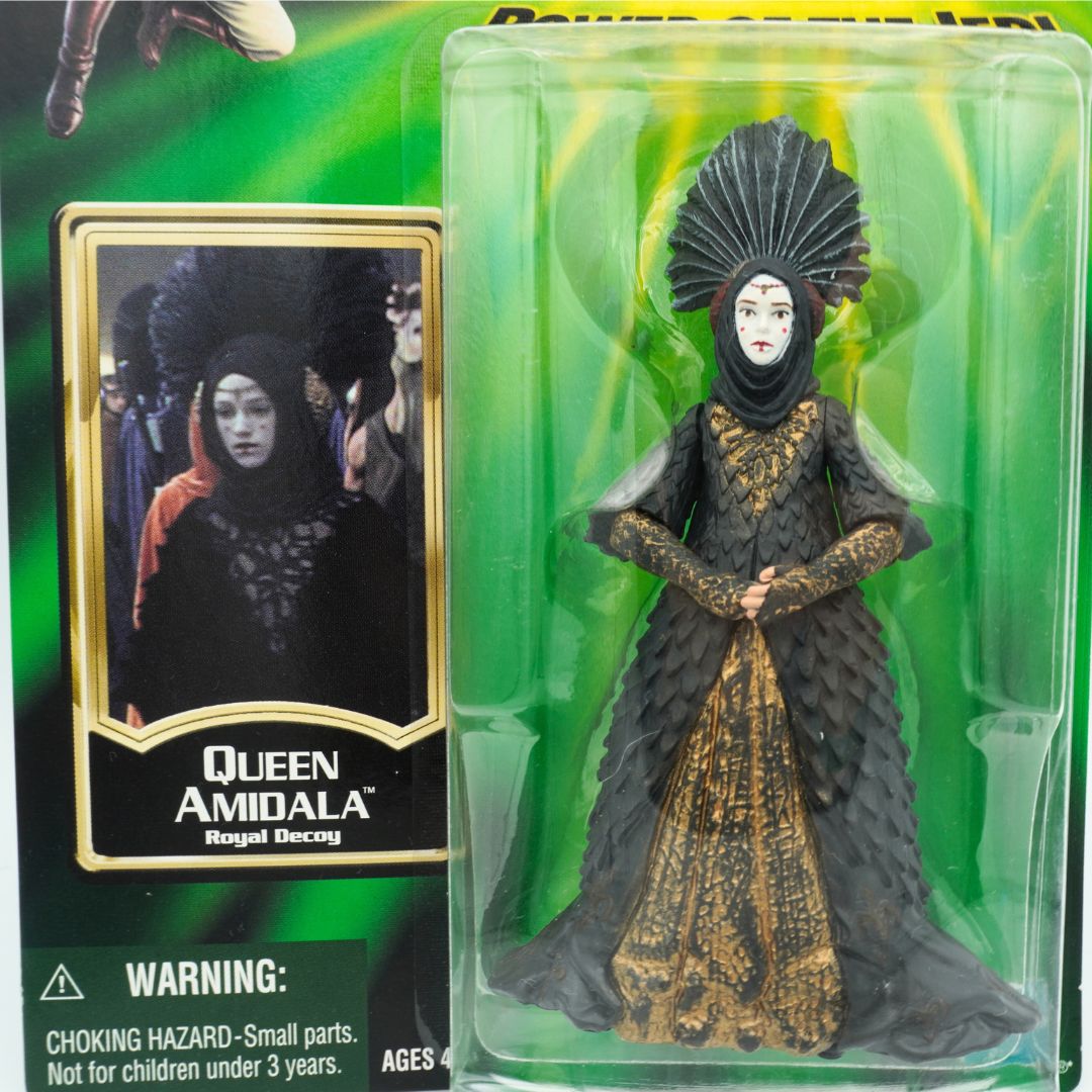 Closeup of the Royal Decoy Queen Amidala figurine in a black and gold gown and headress