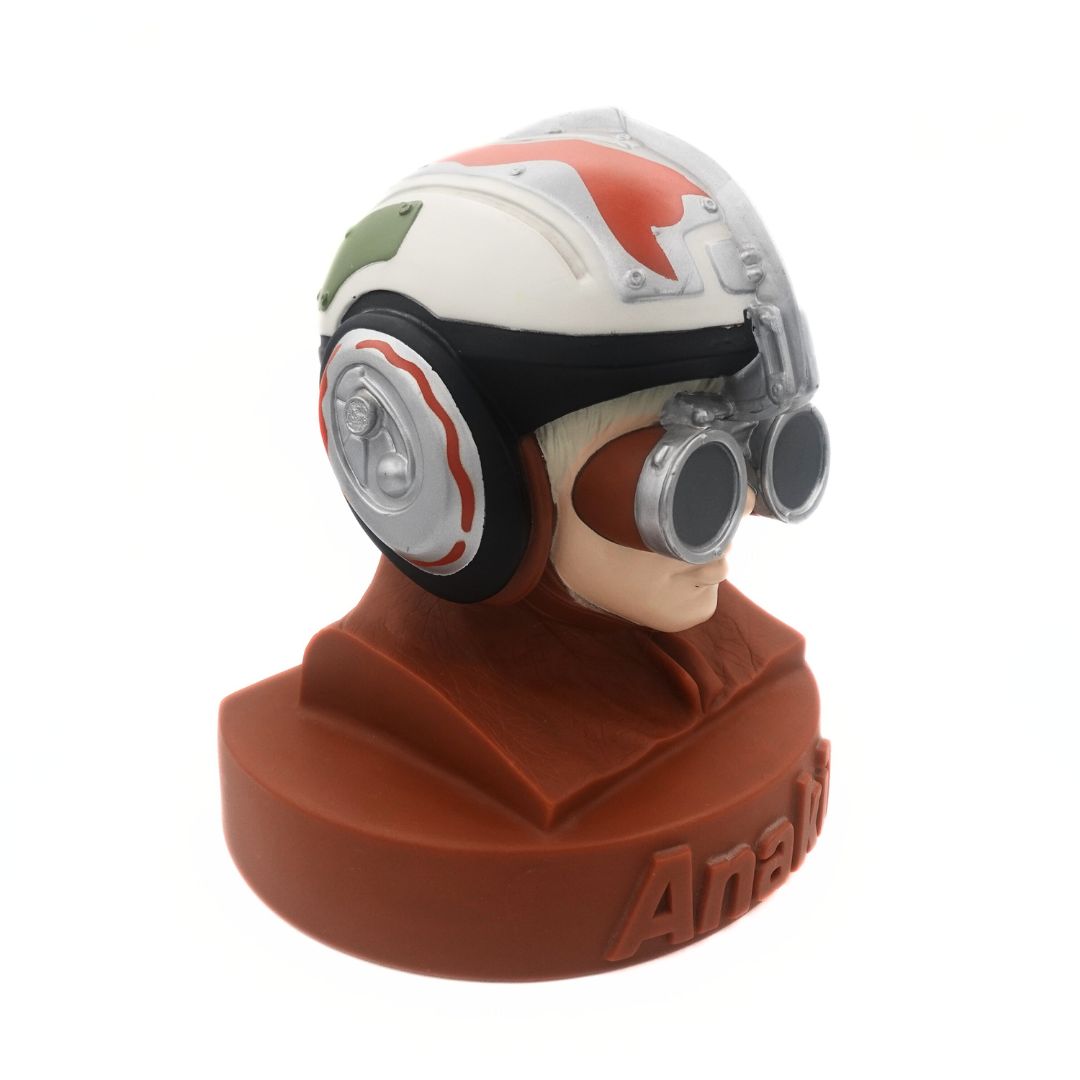 Side on photo of a vintage Anakin Star Wars money box