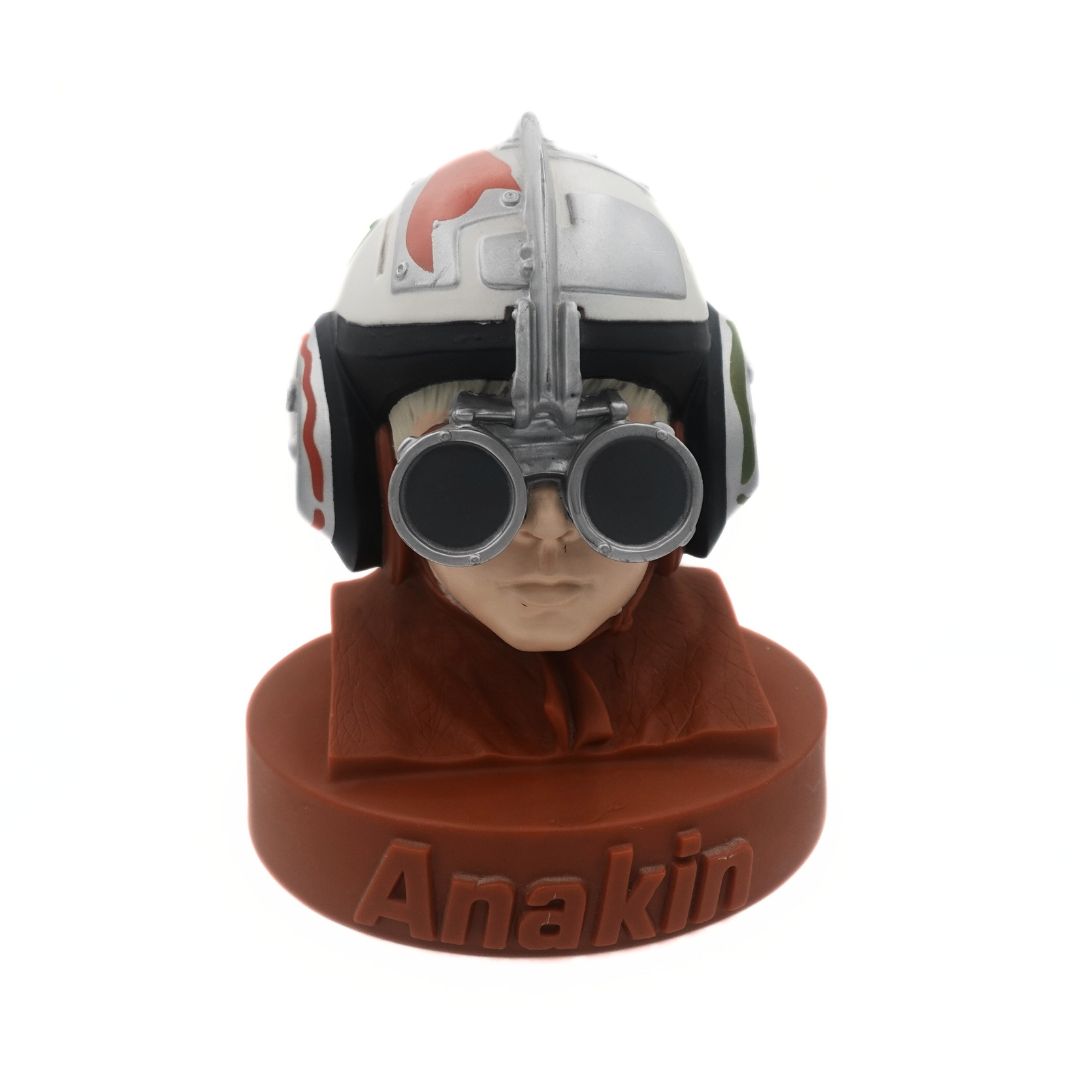 A bust of young Anakin from Star Wars as a hard plastic money box