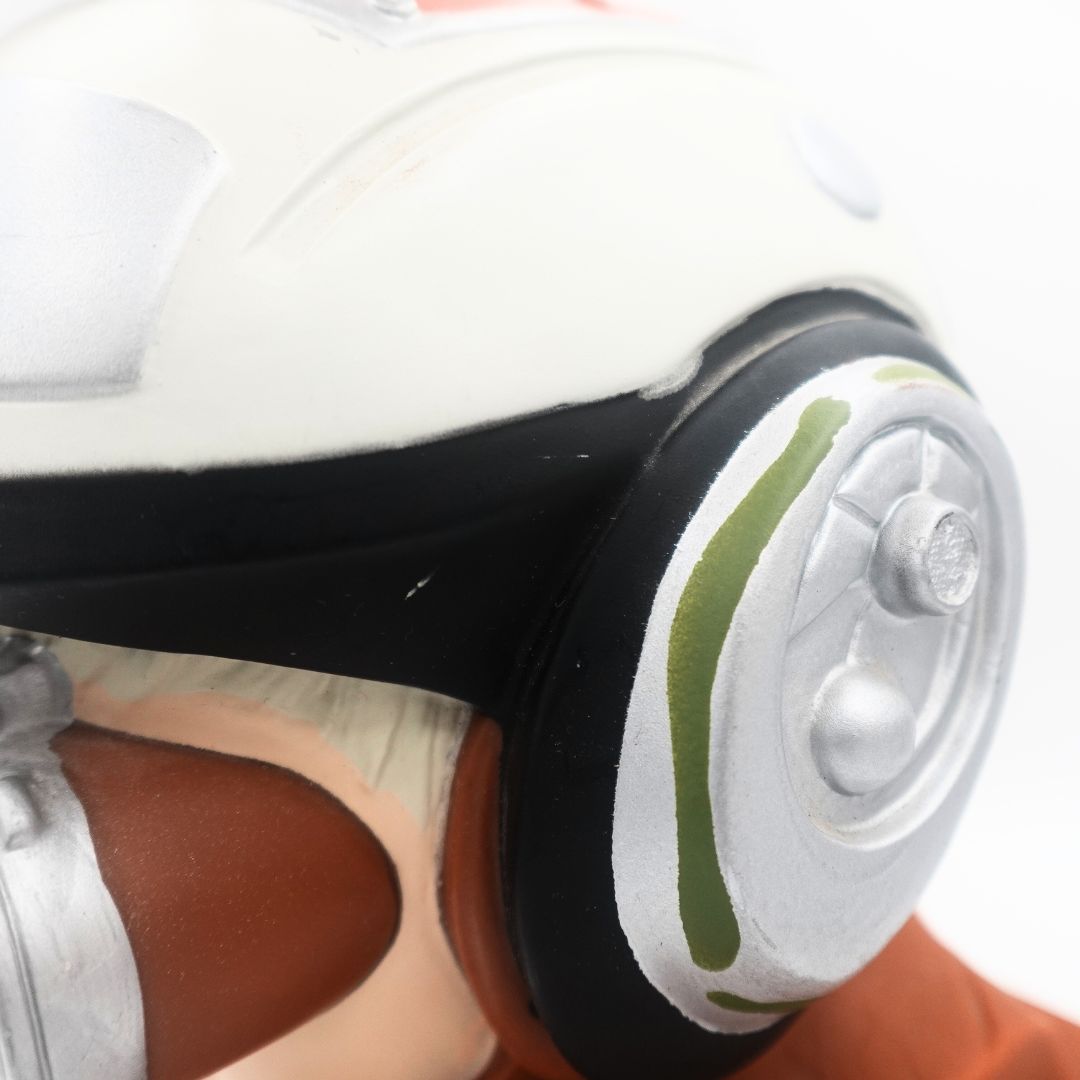 Marks on the side of an Anakin money box