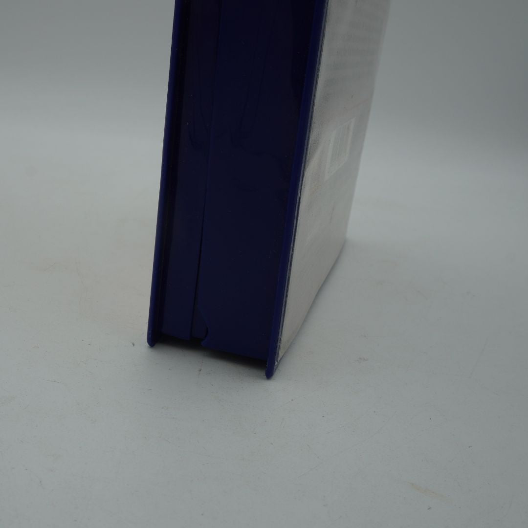 Close-up of a blue and white rectangular object on a light gray background