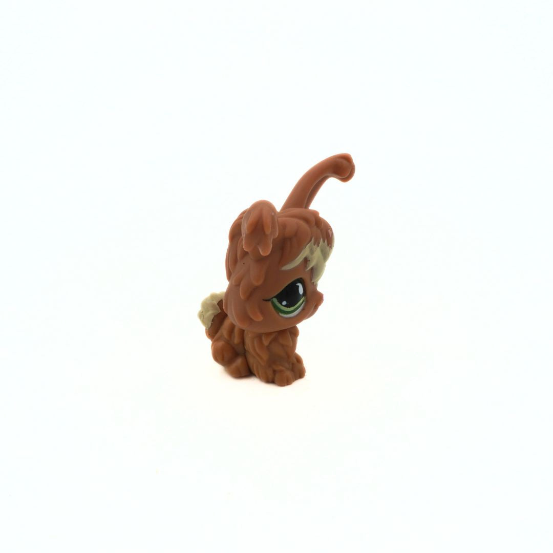 Small brown Littlest Pet Shop rabbit with green eyes