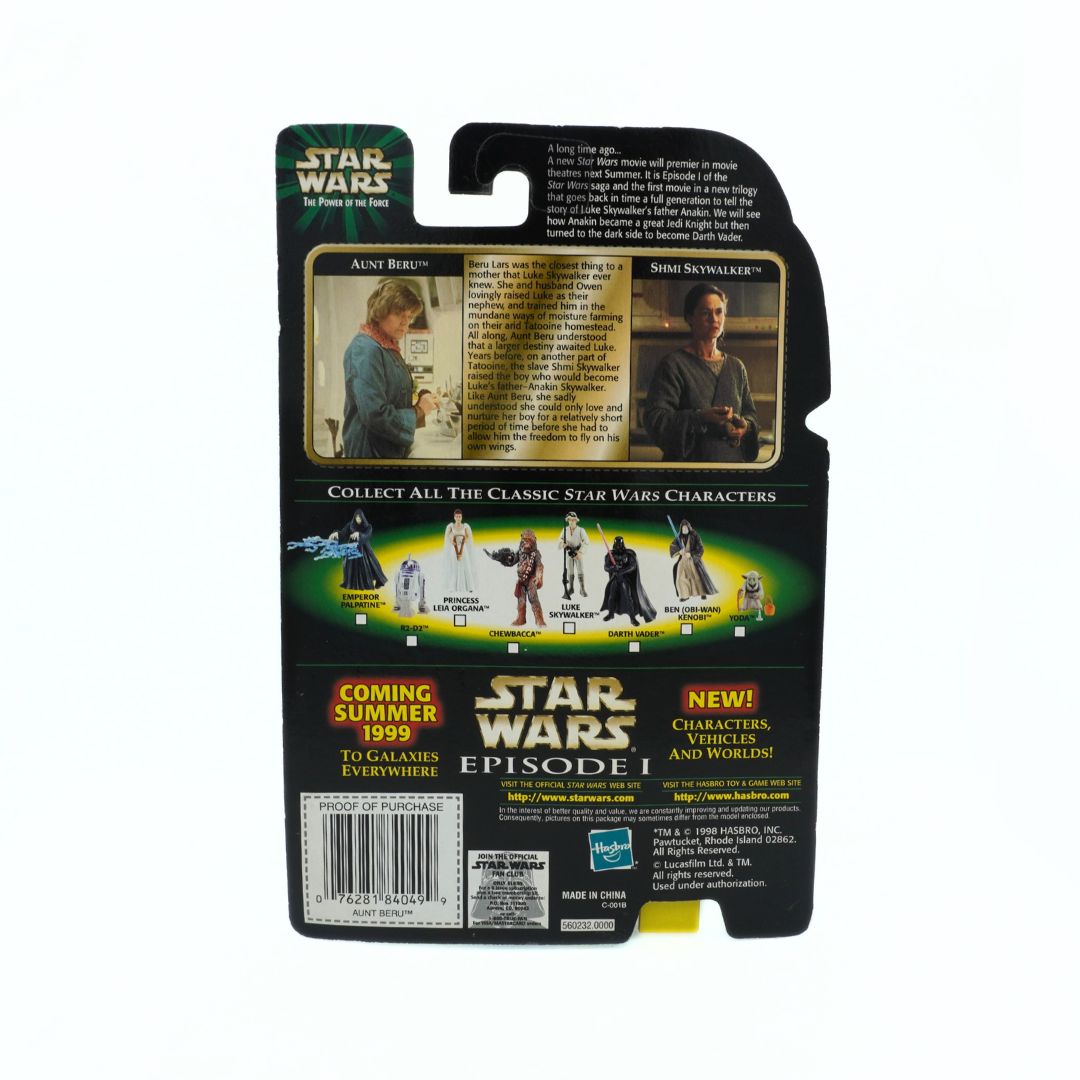 Cardback on a 1998 Aunt Beru toy showing the other toys in the collection and two photos from the movies