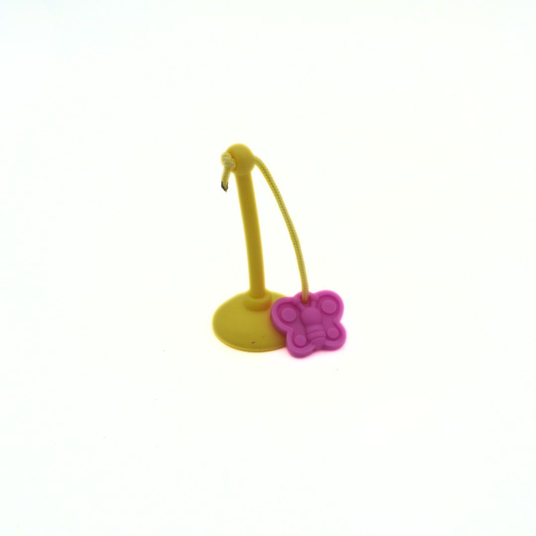 Yellow and pink butterfly-shaped object on a white background