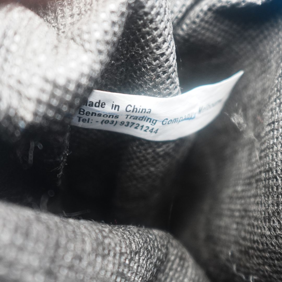 Tag on the inside of a 90s Barbie satchel with its copyright information