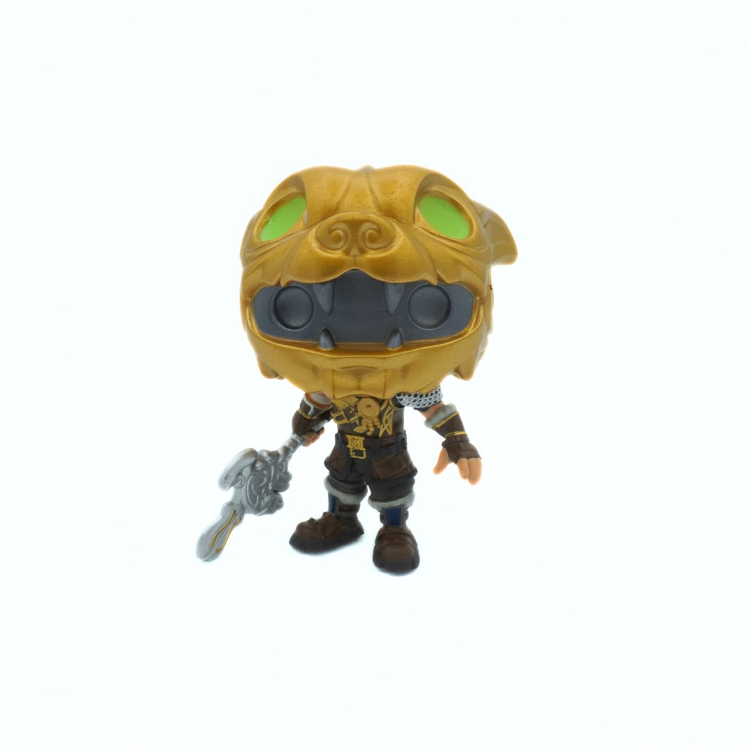 Figurine with a yellow helmet and green eyes on a white background