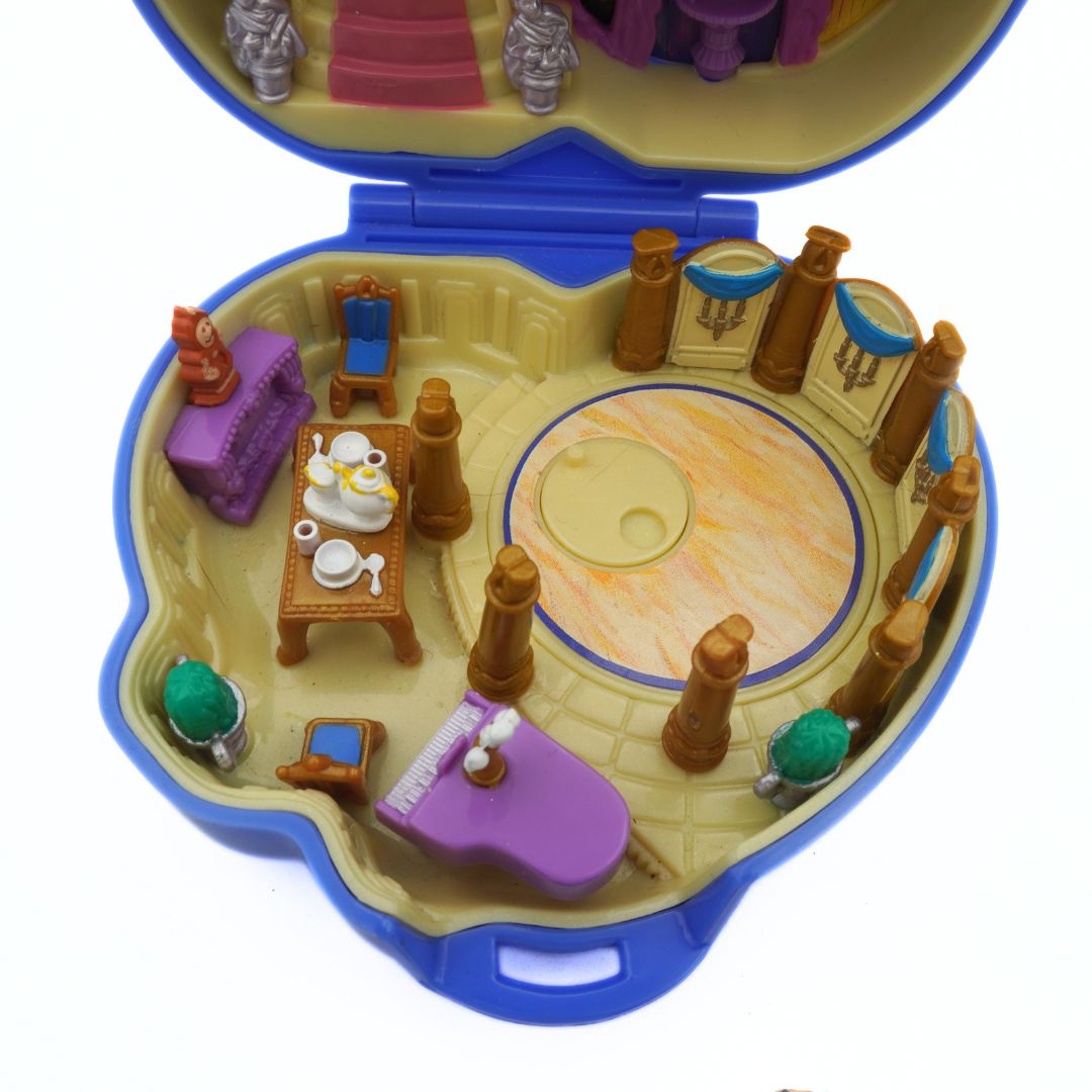 Toy set with furniture and figures in a blue carrying case