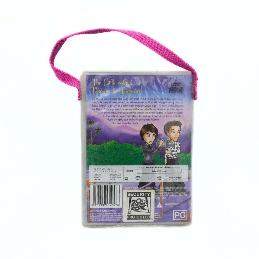 Back view of a DVD case with a pink strap, featuring characters and text.