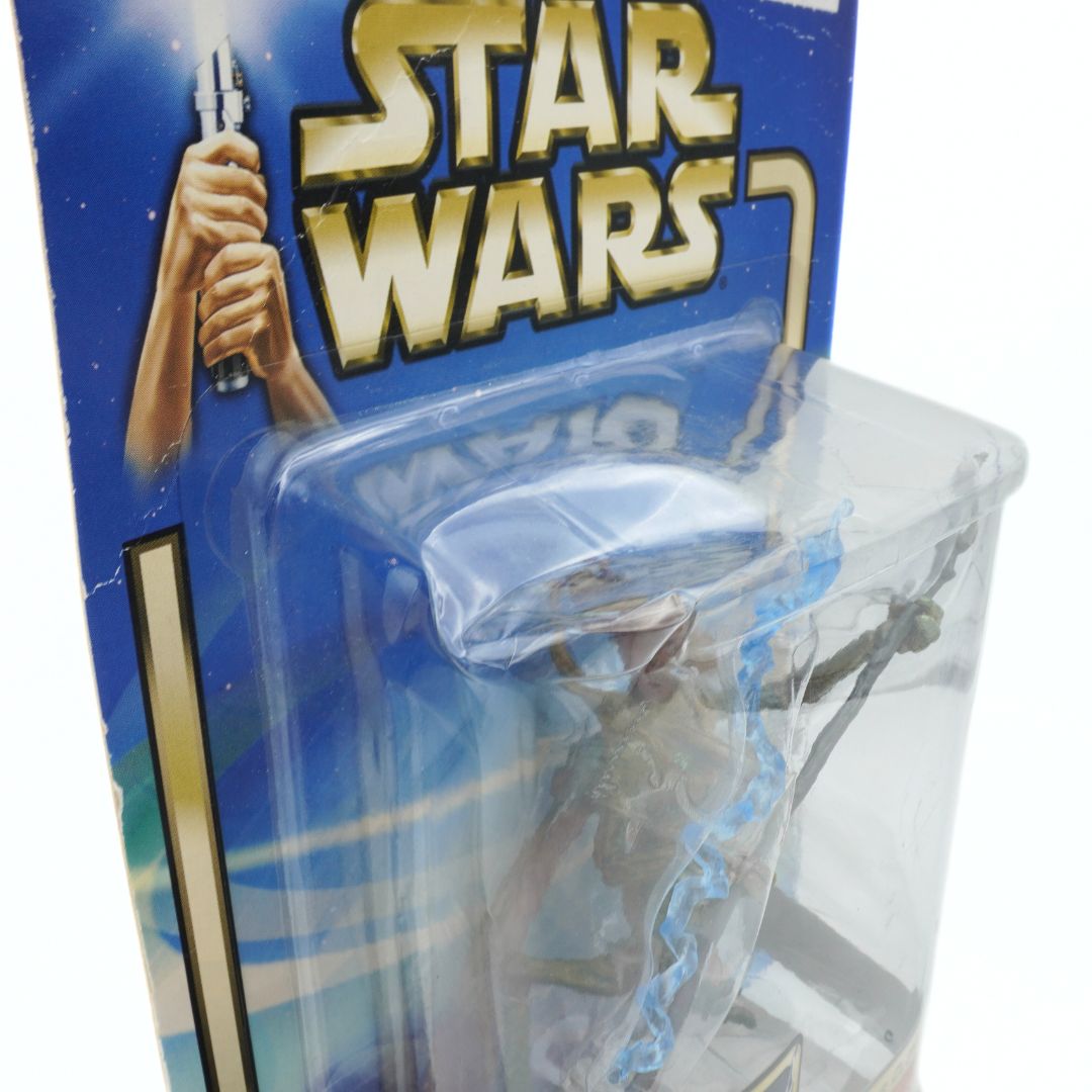 Dint to the bubble on an in-packaging Geonosian Warrior toy