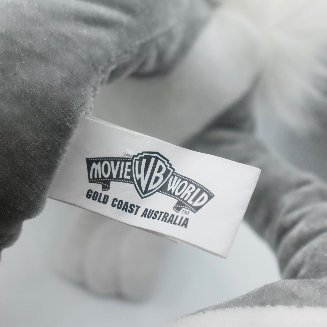 Tag on a WB Movie World Bugs Bunny plush showing the theme parks logo