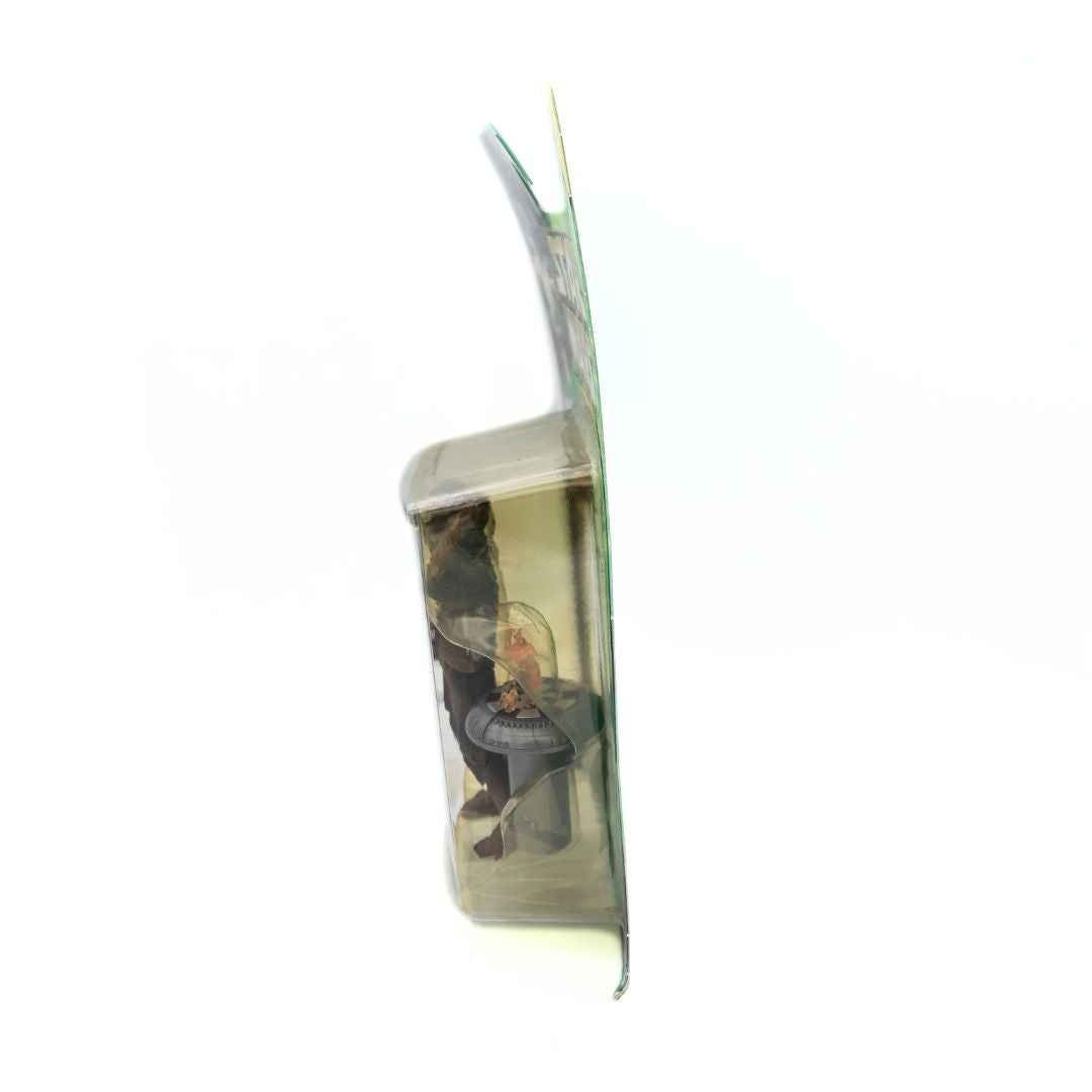 Side on photo of the Chewbacca Dejarik Champion in its packaging, showing warping to cardback