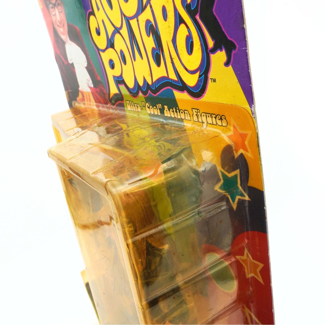 Crack on the side of the plastic bubble seen on a 1999 Austin Powers Felicity Shagwell figurine