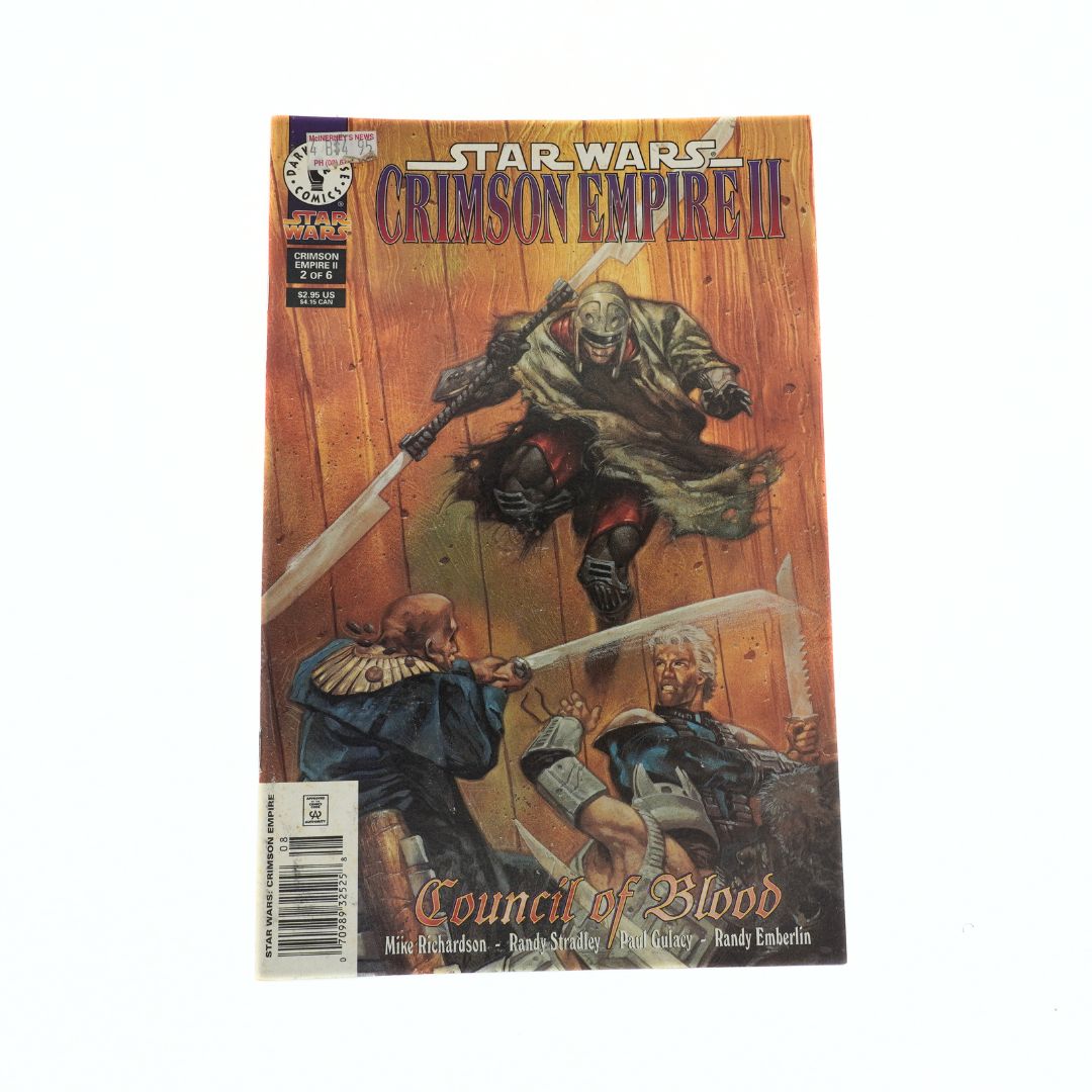 Comic book cover titled 'Star Wars: Crimson Empire II - Council of Blood' with action scene on wooden background