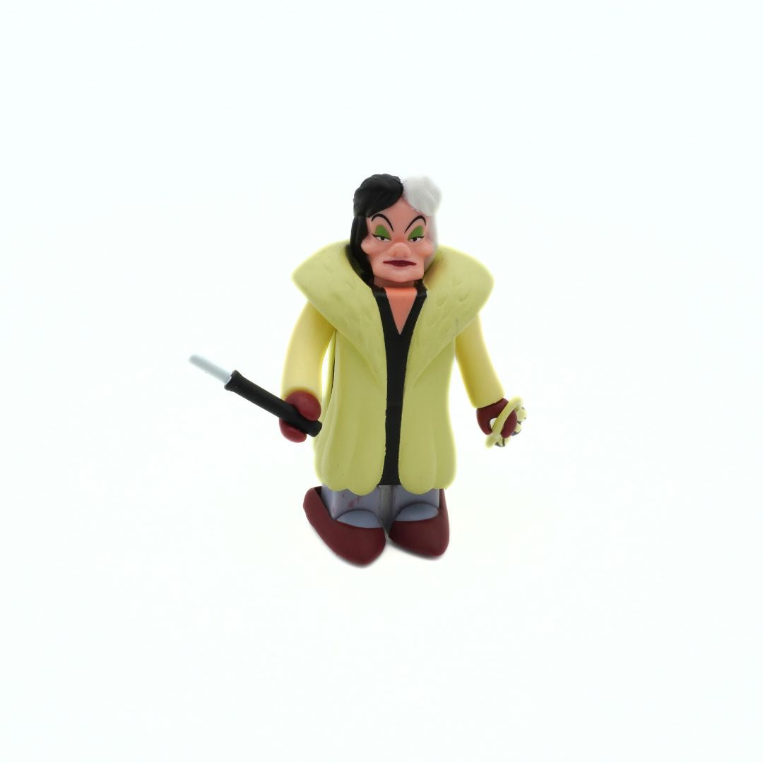 Vintage Disney Kubrick Cruella Deville mini figurine in a light yellow coat with red accessories