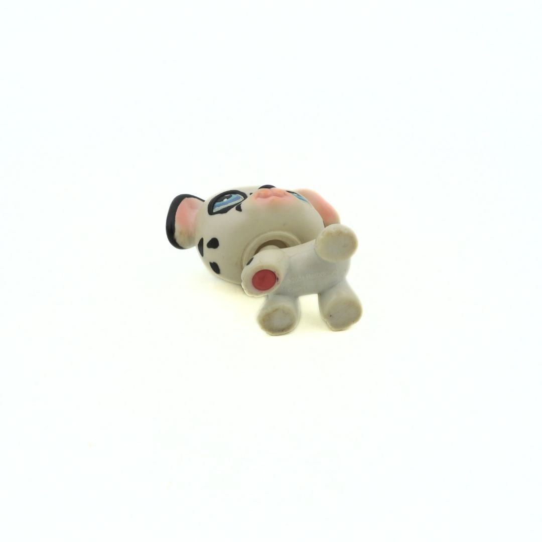 Underside of a vintage 2004 black and white Dalmatian made by Littlest Pet Shop