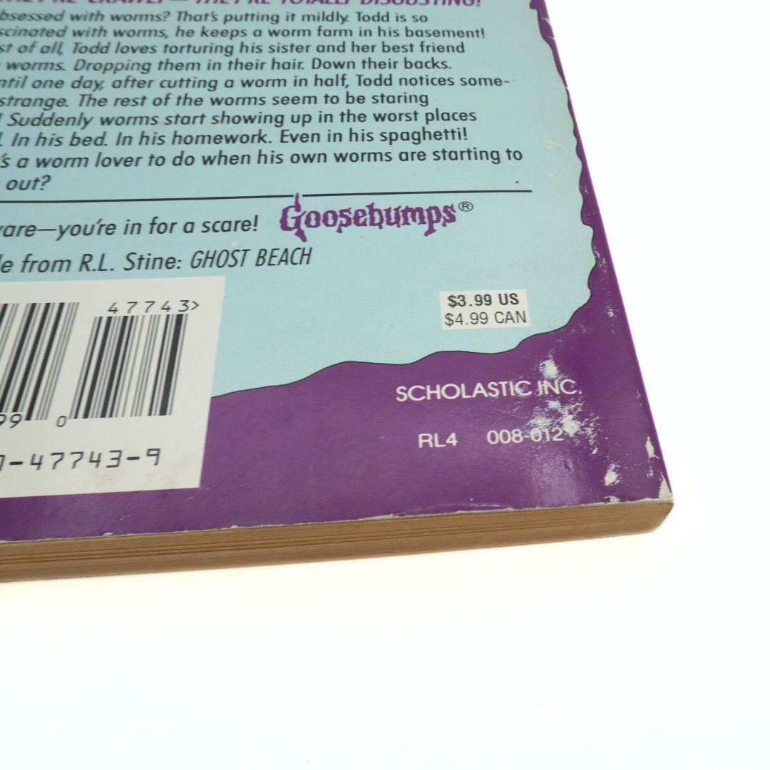 Back cover of a Goosebumps book with text and branding