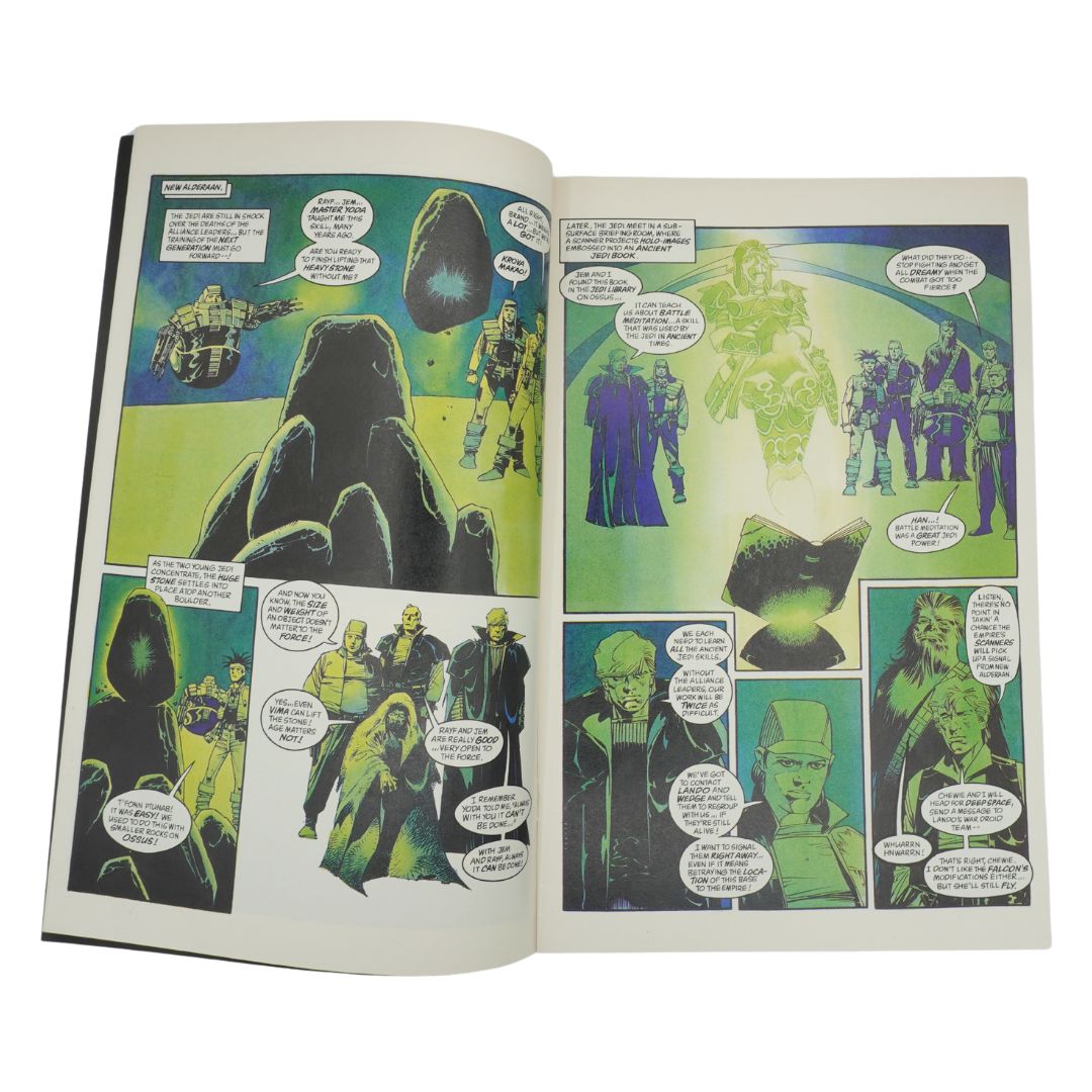 Comic book open to a page with green alien characters and spaceships.