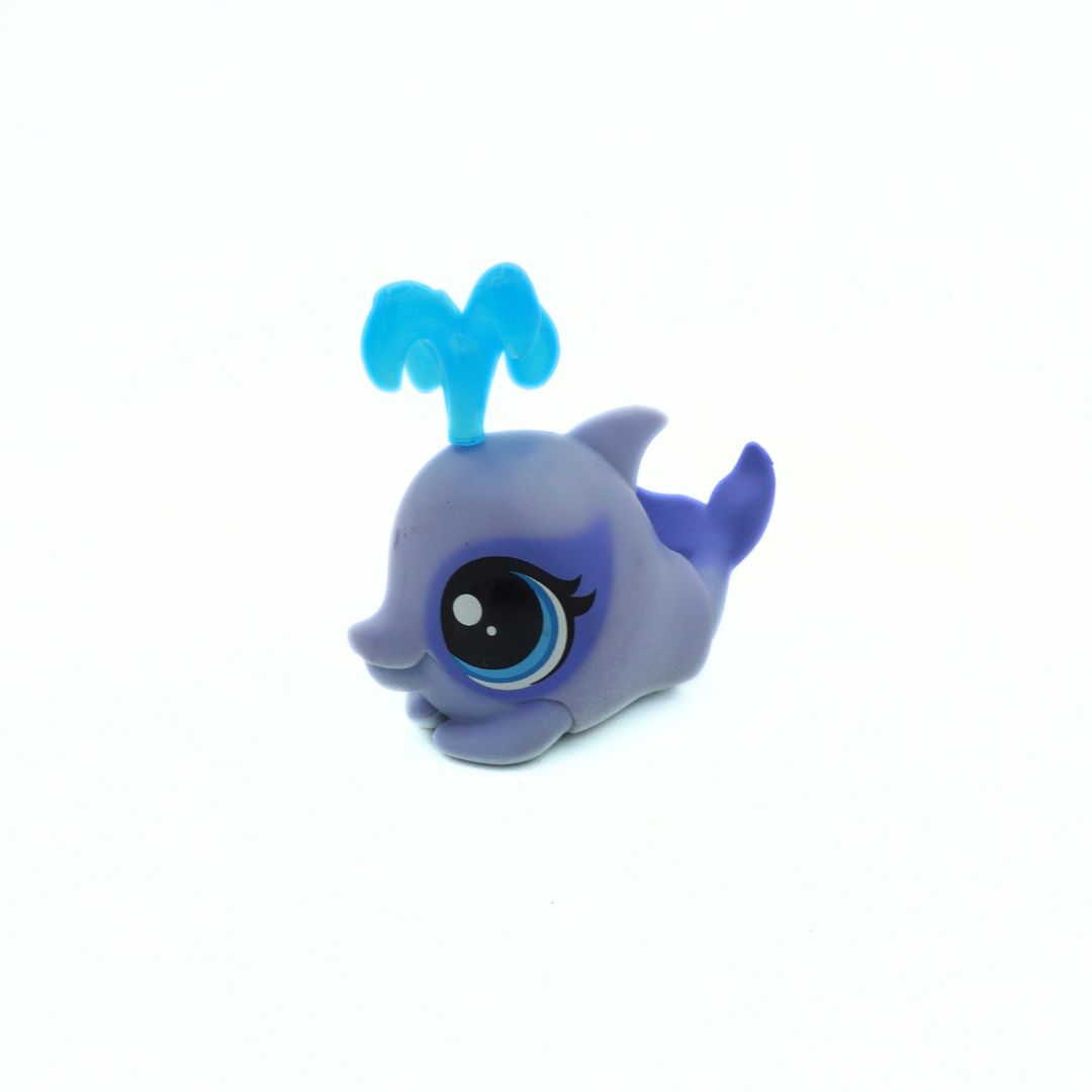 Small blue and gray toy figure on a white background