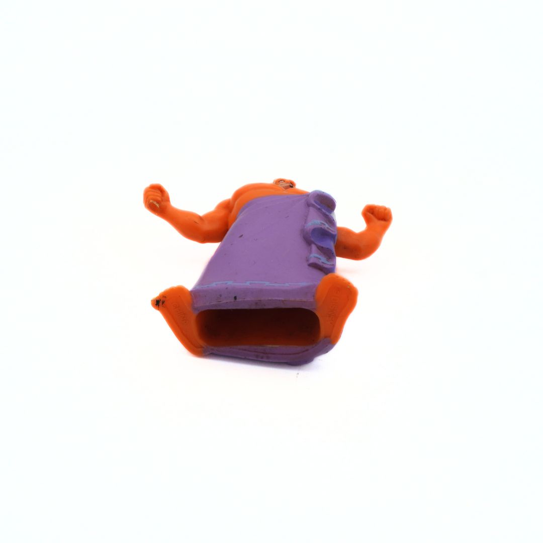 Purple and orange toy on a white background