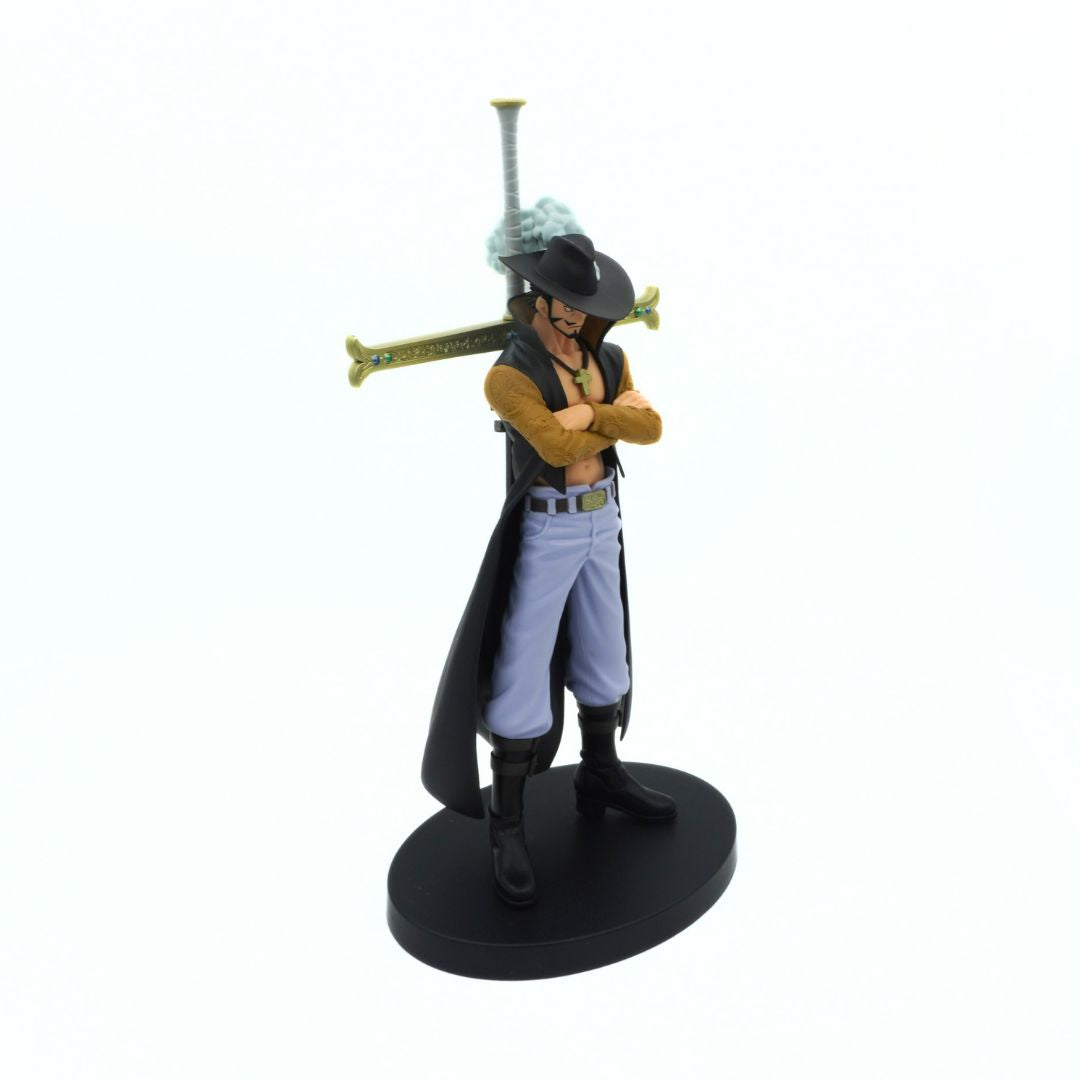 Angled photo of a One Piece Dracule Mihawk figurine on a black stand wearing a black outfit with blue pants