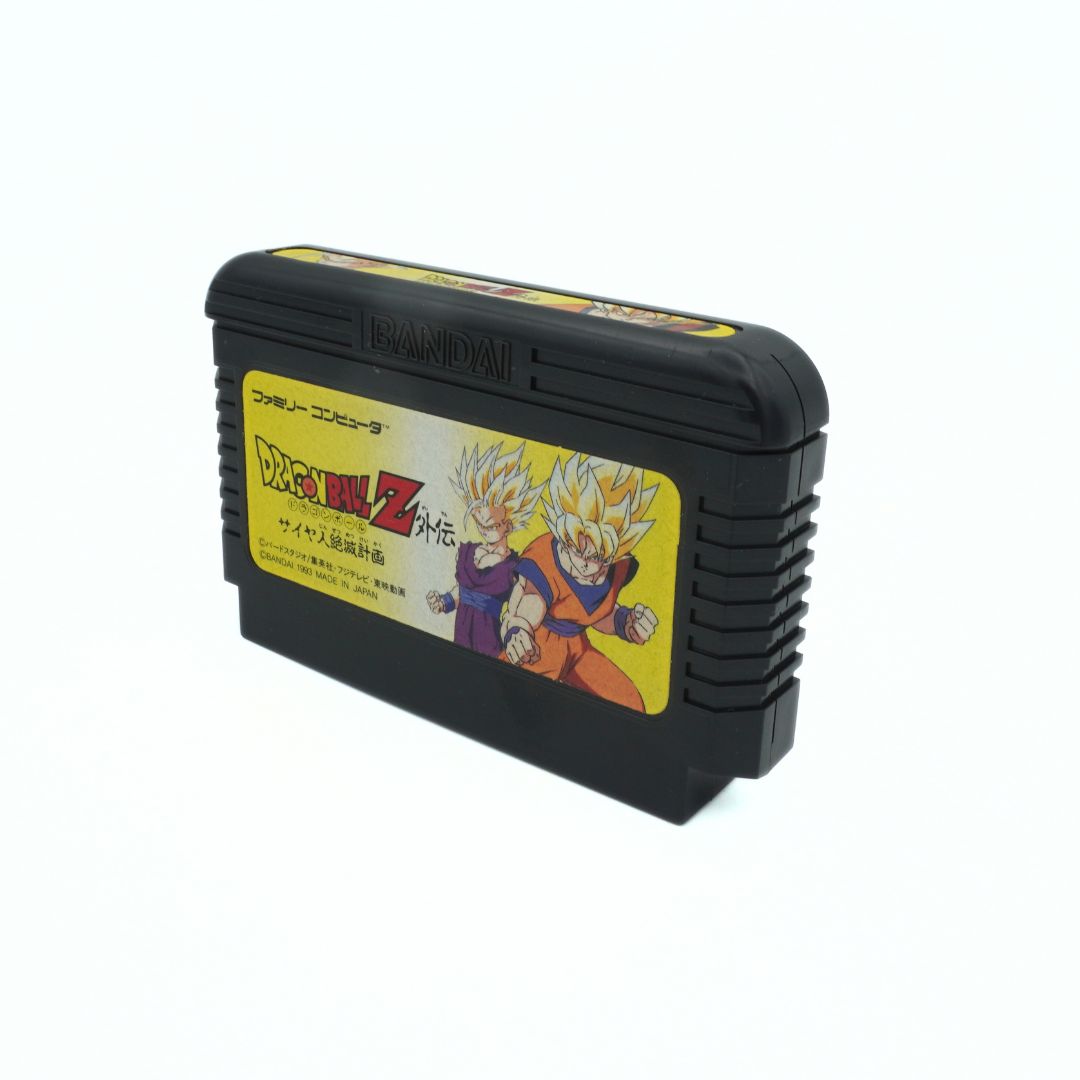 Black cartridge and yellow stickered FamiCom Dragon Ball Z game