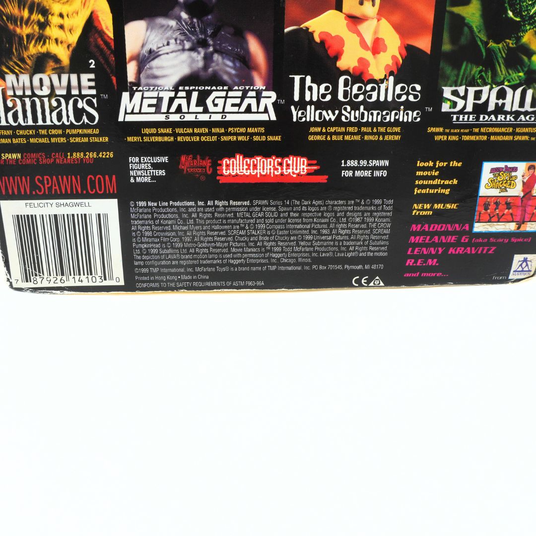 Branding and copyright information on the base of the cardback on a 1999 Austin Powers action figure