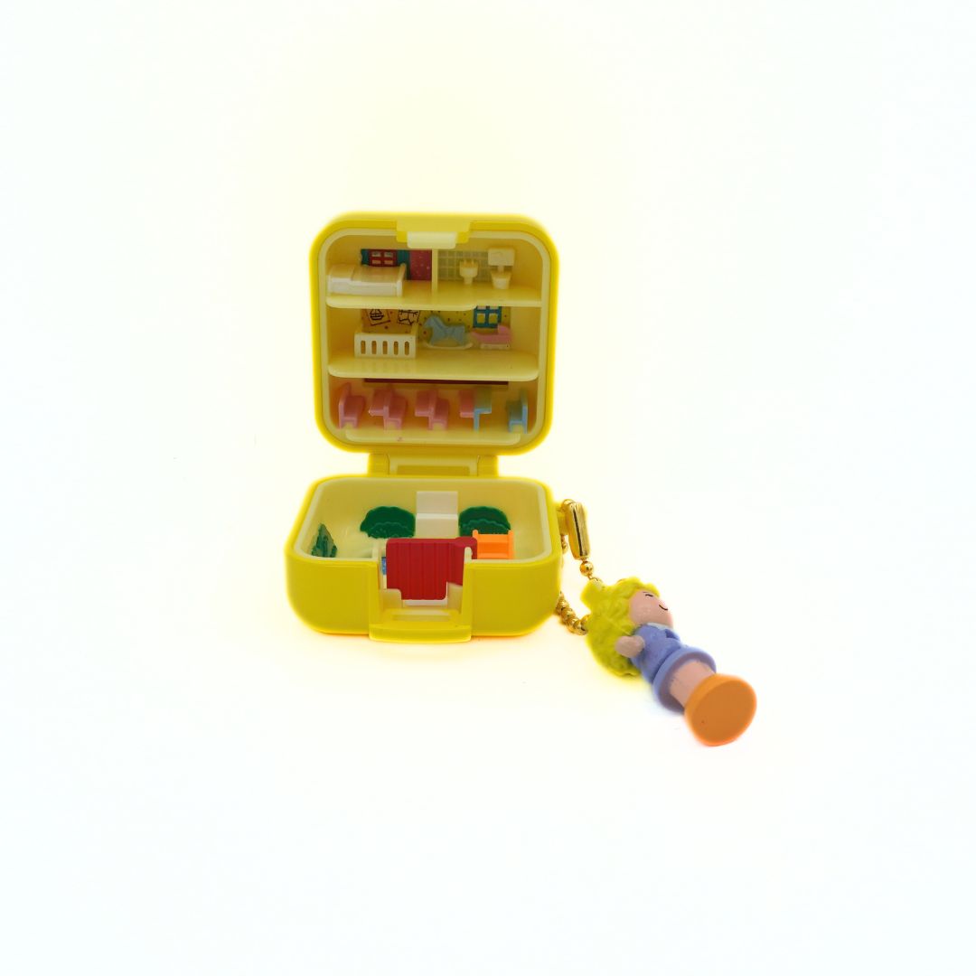 Yellow mini Polly Pocket released as a Gacha toy