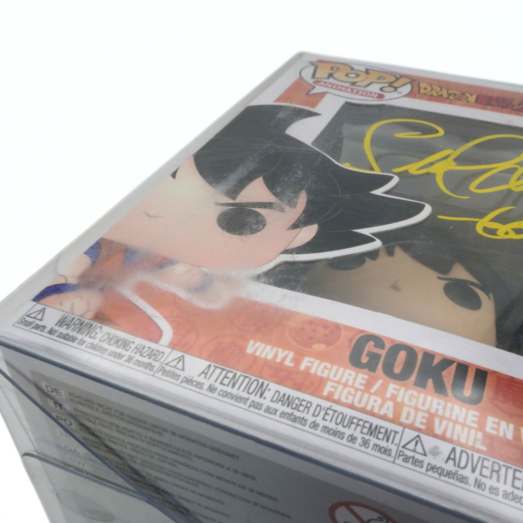 Box packaging of a vinyl figure with character illustration and branding