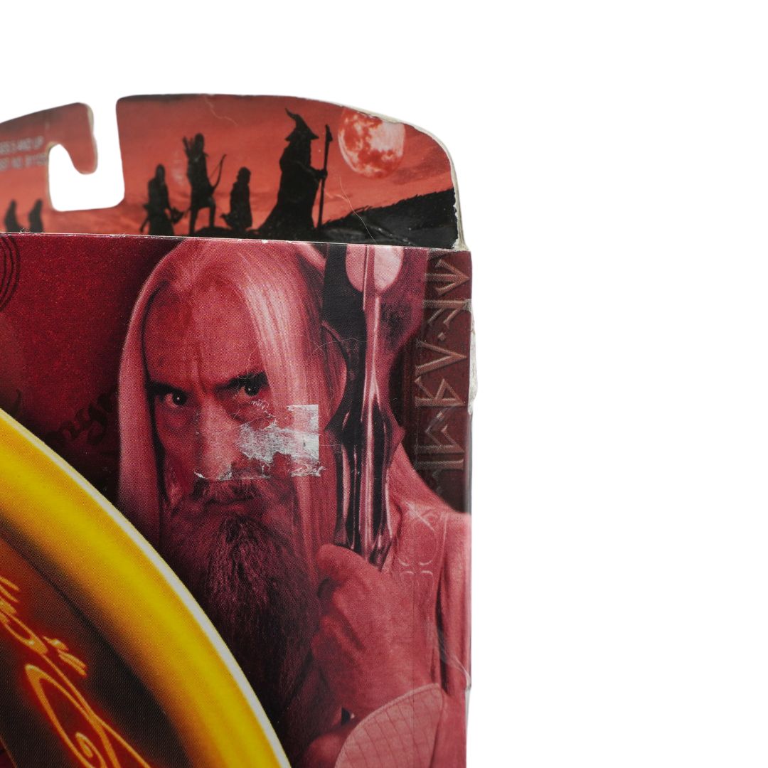 A front on photo of Grishnakh from Lord of the Rings in red and yellow packaging on a white background