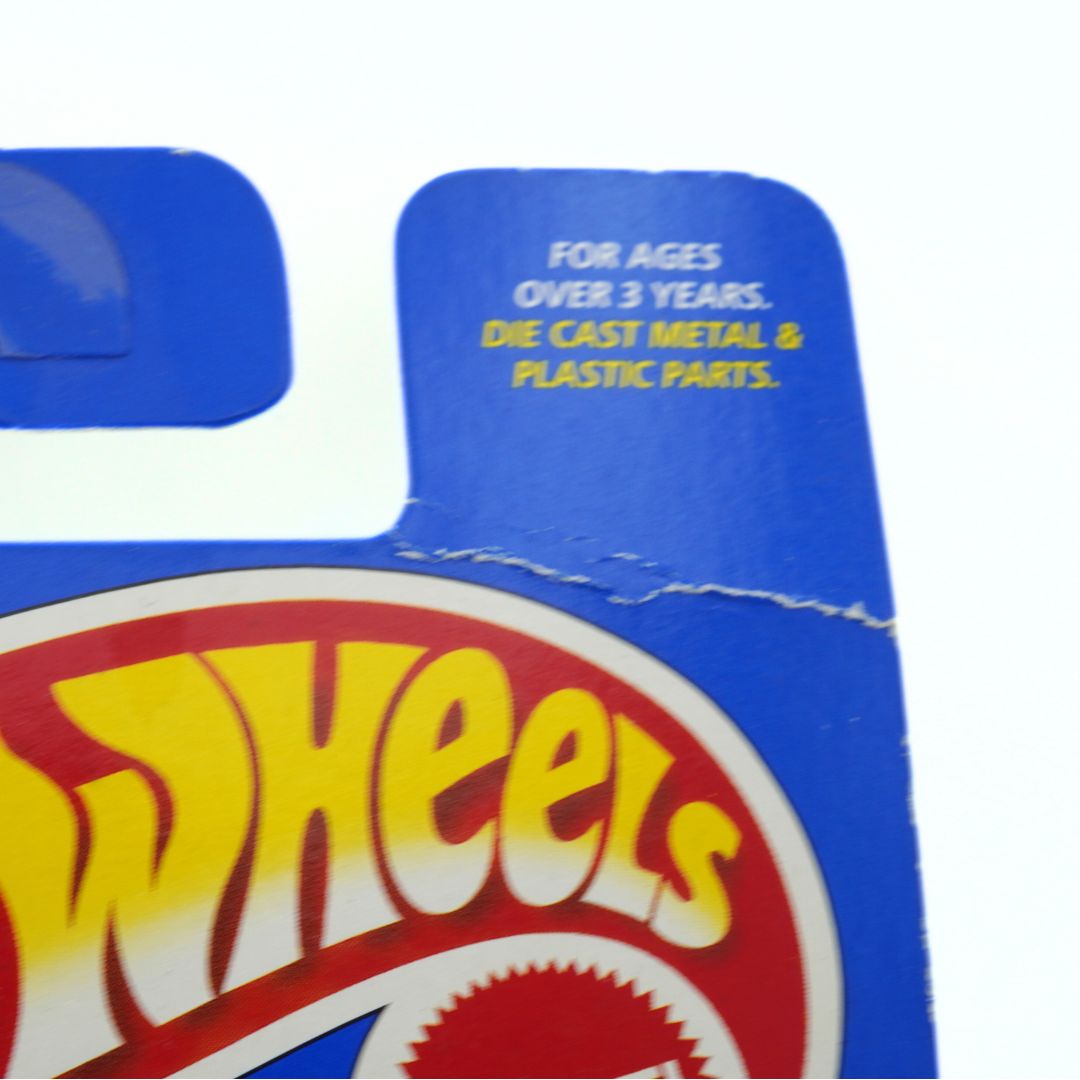 Close-up of a 'Hot Wheels' toy packaging with text on a white background